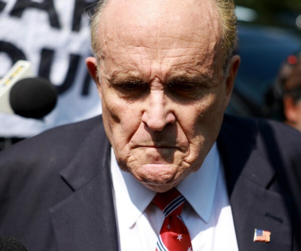 rudy giuliani georgia fulton county turn in  