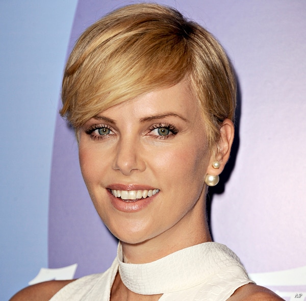 Charlize Theron Neck Surgery to Fix Vertebrae Hardly Slows Her