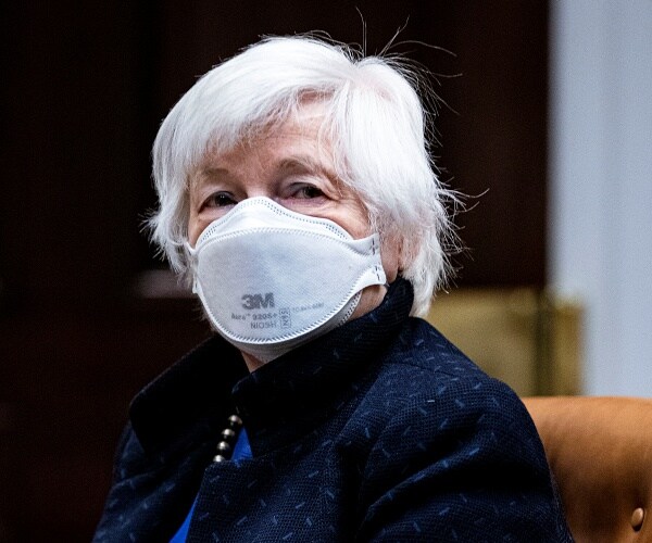 janet yellen sits in meeting