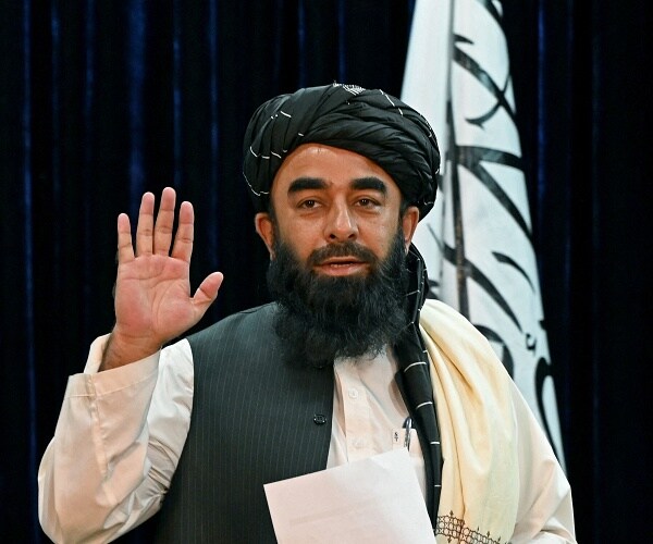 taliban spokesman waves