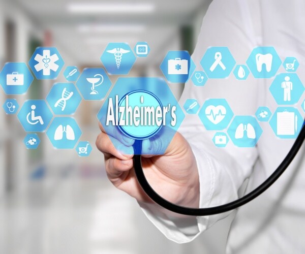 a physician holding up a stethoscope to a screen with title "Alzheimer's Disease" and other research logos