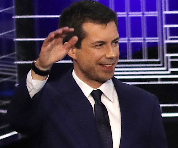 pete buttigieg gestures during the democratic presidential primary debate