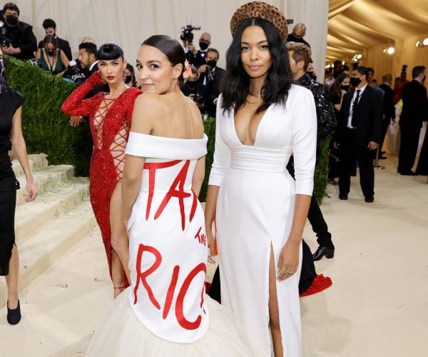 the two women pose for the camera