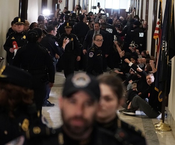 federal workers protest outside senator mitch mcconnell's office