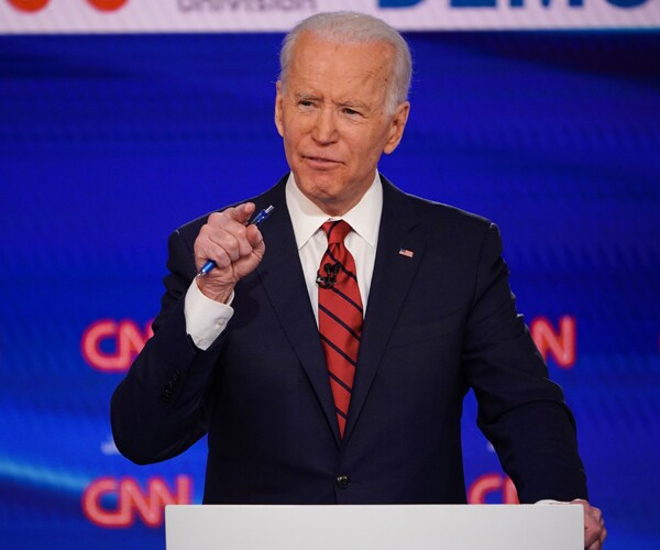 joe biden on stage during a presidential debate