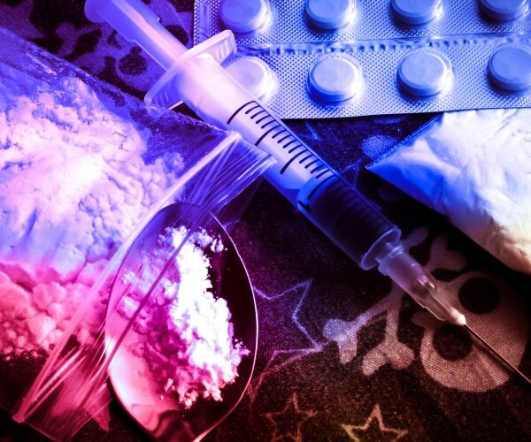 powder opioids, syringe, other paraphernalia