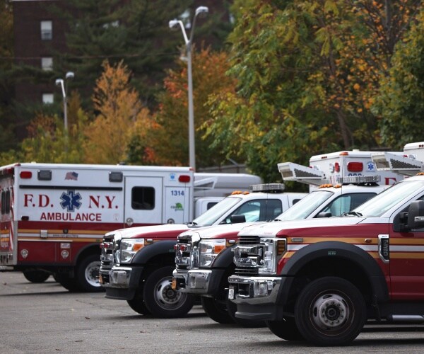 new york city fire department vehicles are parked