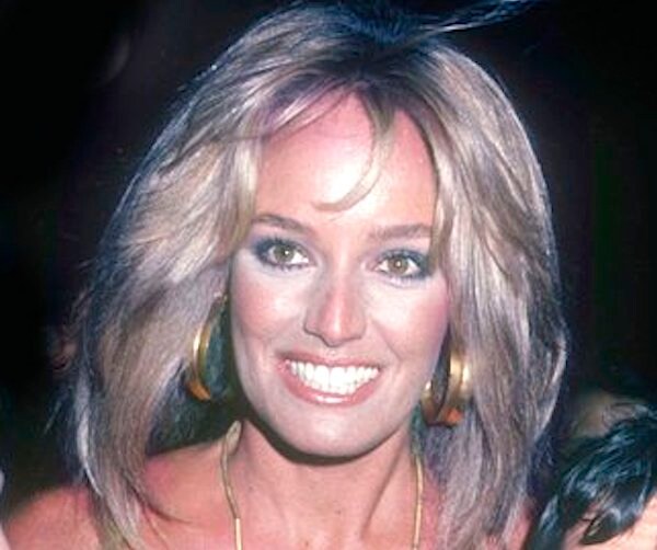 Susan Anton smiles with big hair in 1985