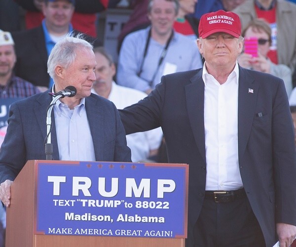 donald trump wears a maga had and jeff sessions support his campaign