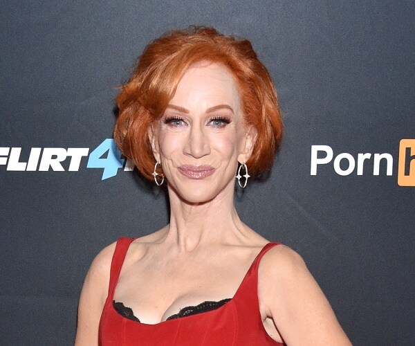 kathy griffin stands on red carpet