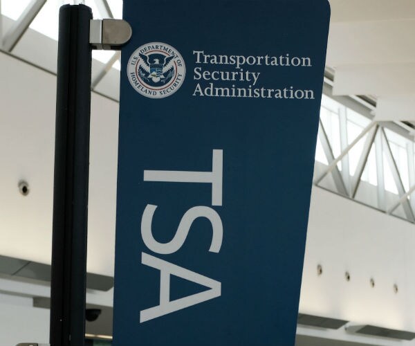 a sign marking airport screening of the tsa