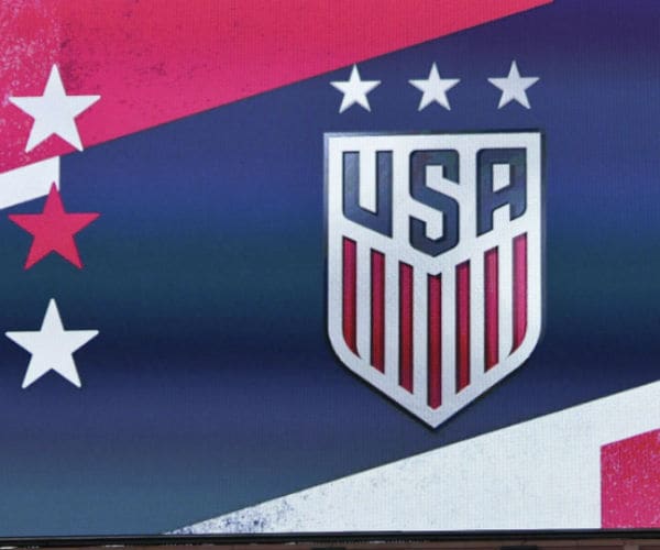 the usa soccer team logo is seen on a billboard