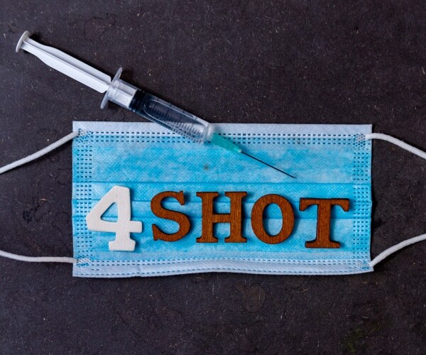 surgical mask with blocks saying 4th shot and a syringe