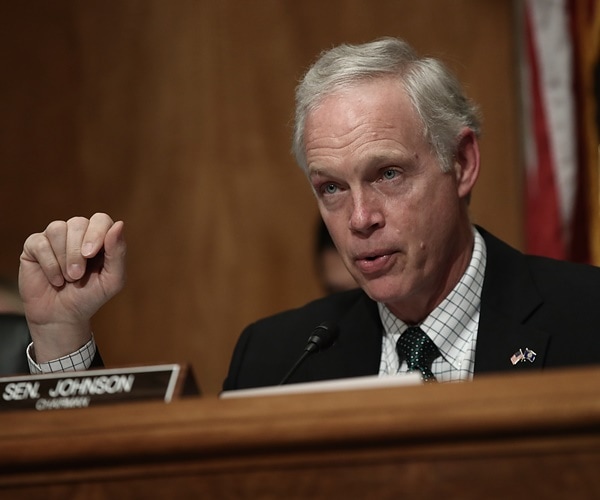 ron johnson chairs a meeting