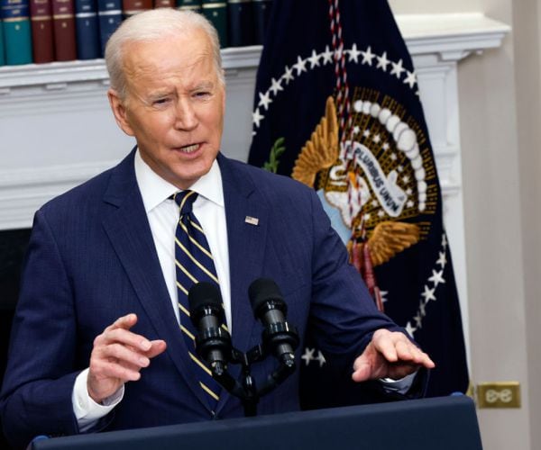 Joe Biden speaks at a podium