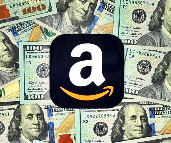 amazon logo amid backdrop of cascading dollar bills