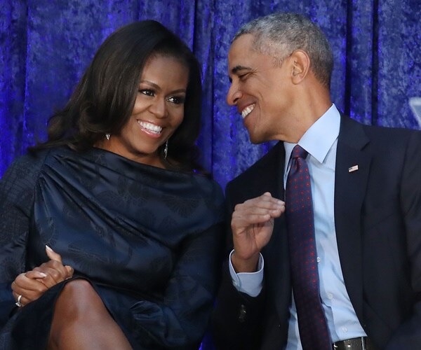 barack and michelle obama at the unveiling of their official portraits  at the Smithsonian's National Portrait Gallery