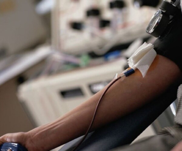 arm of person giving blood