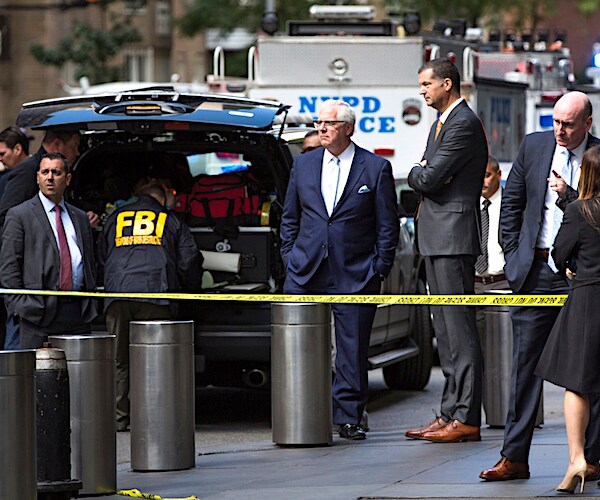 john miller, center, arrives outside time warner center on wednesday in new york city