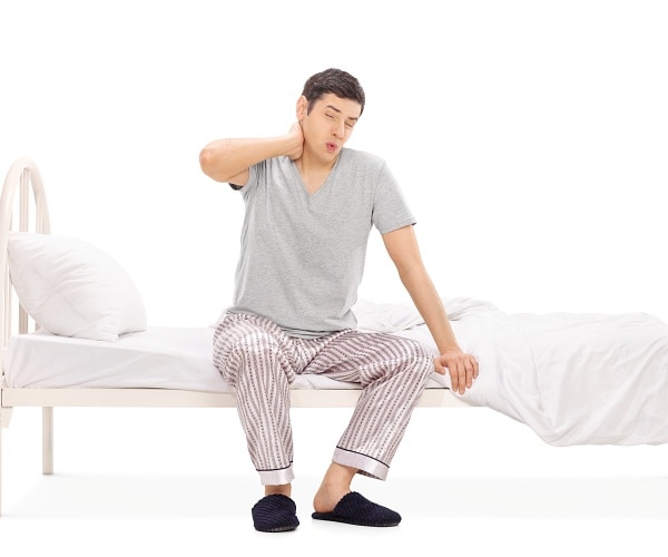 man getting out of bed