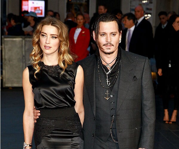 Amber Heard Accuses Estranged Husband Johnny Depp of Domestic Violence