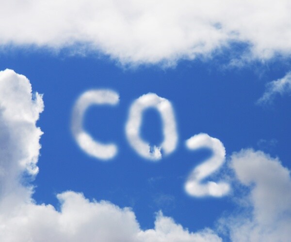 carbon dioxide symbol in blue sky and cloud