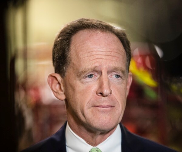 pat toomey speaks with the media