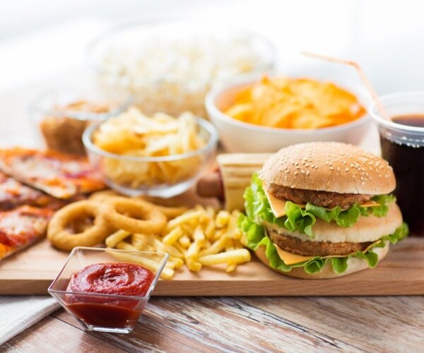 hamburger, fries, pizza, soda, other foods that contain additives