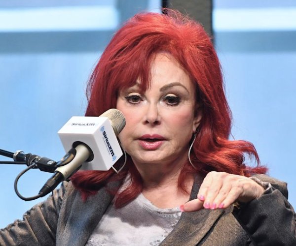 naomi judd talking on a radio show