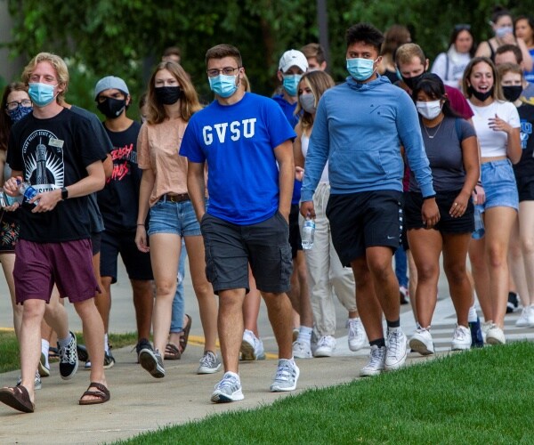 students and pedestrians at grand valley state university