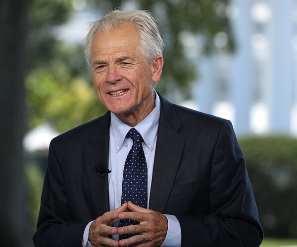 peter navarro is interviewed on the white house lawn on a sunny day