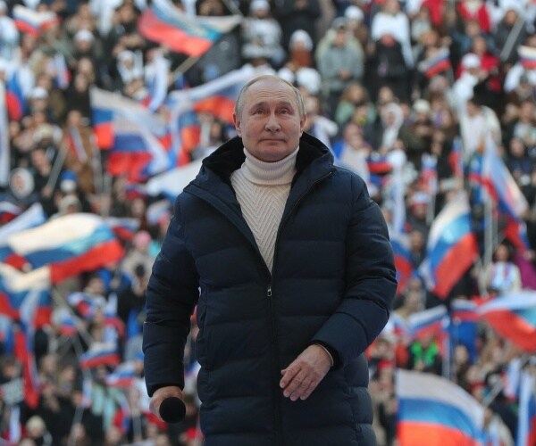 Vladimir Putin attends a concert