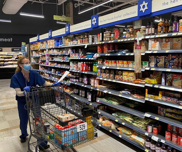 a shopper at a grocery store in kansas