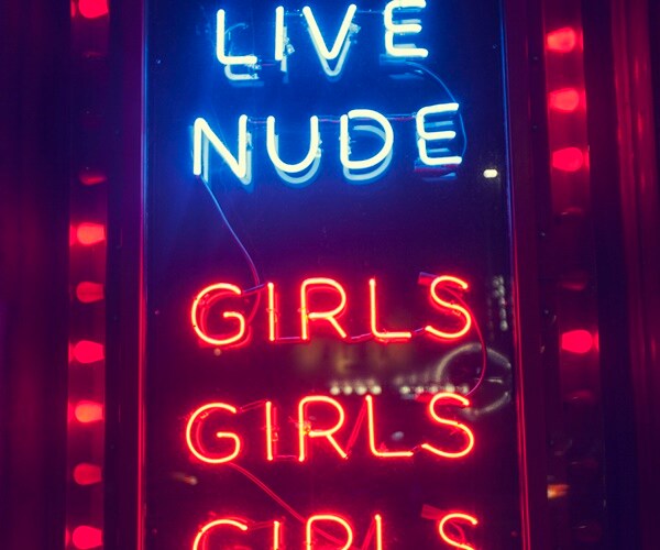 neon sign from a strip club