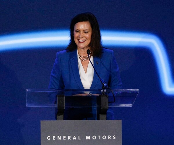 gov. gretchen whitmer speaks on a stage