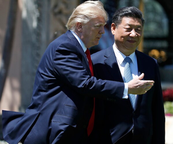 donald trump shows xi jinping the way forward during a summit