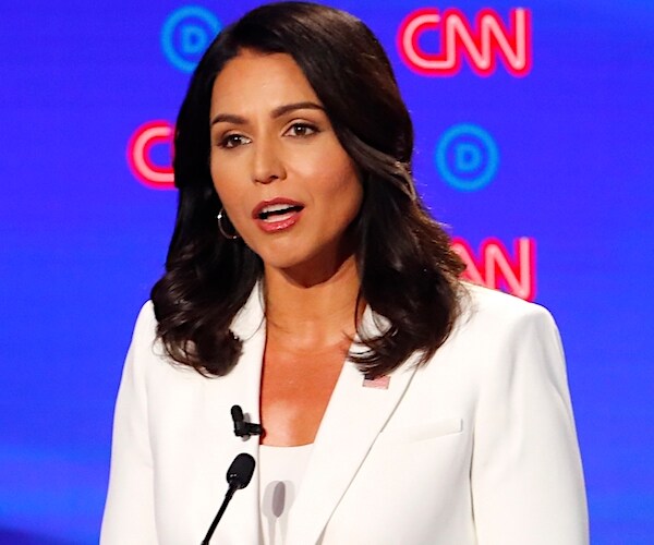 tulsi gabbard speaks during a presidential primary debate