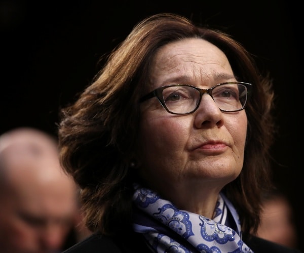 haspel in a blue patterned scarf