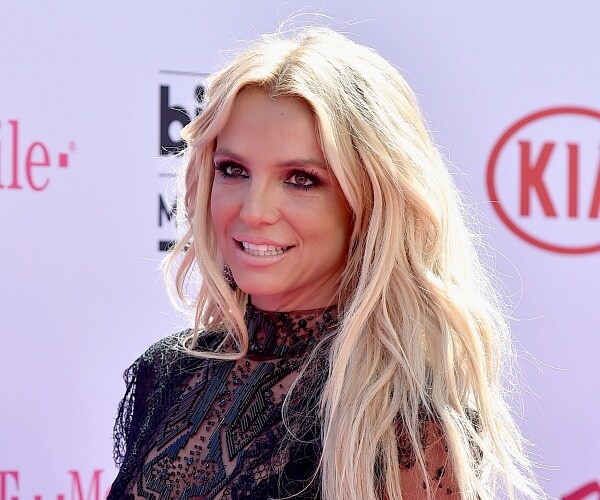 britney spears stands on red carpet