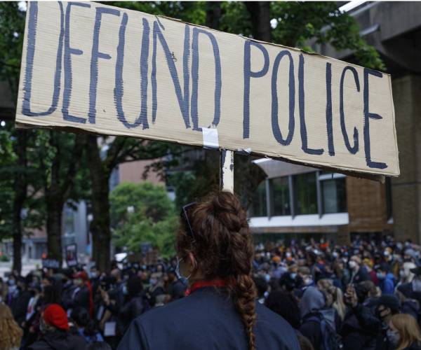 protesters carrying signs