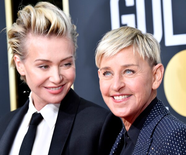 portia de rossi smiles at her wife ellen degeneres