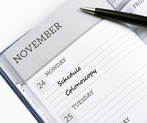 'schedule colonoscopy' written in calendar