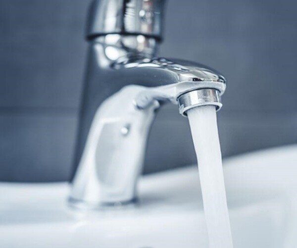 sink faucet with water coming out