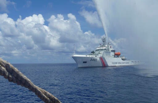 Philippines: China Still Guarding Shoal but Filipinos Back