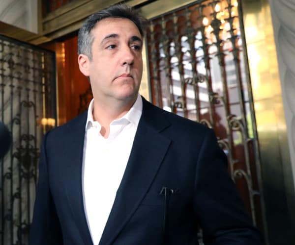 michael cohen in a suit and white dress shirt