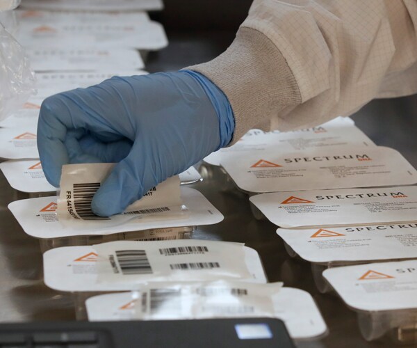 saliva test kits in a factory