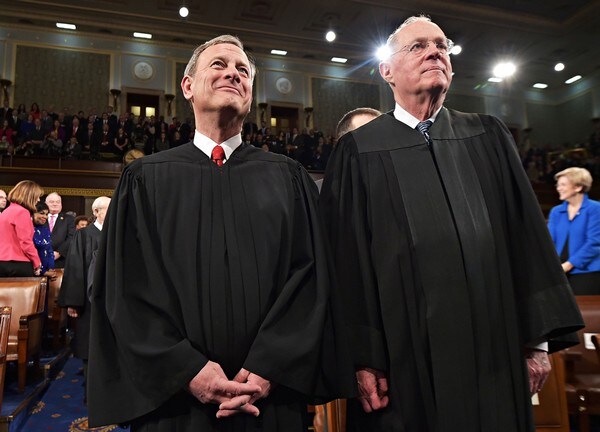 Roberts, Kennedy Question Gay Marriage as Court Clash Starts