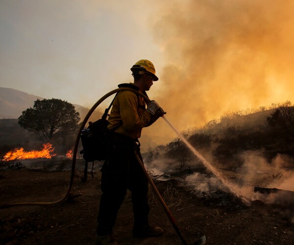 California Wildfires Move Firefighters Into Action Inland and on Coast