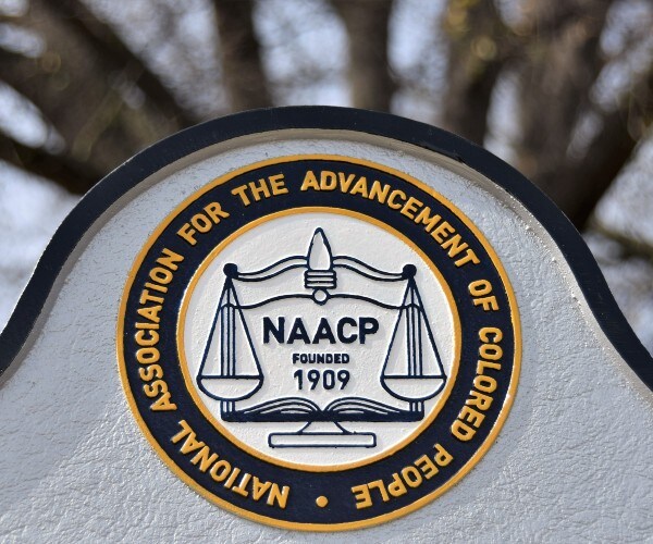 naacp sign with year of founding of organization  