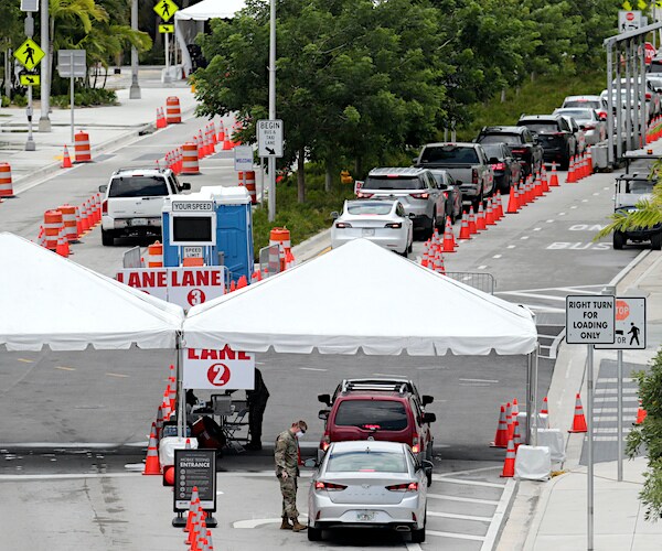 cars line up in south florida for covid-19 testing